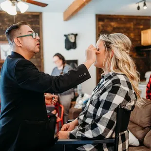 Getting my makeup done by Juan.