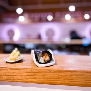 The first hand roll of the set: salmon