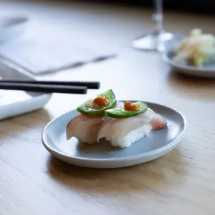 Yellowtail Nigiri: Jalapeno, Yuzu, Sriracha