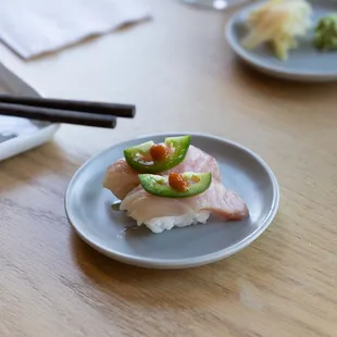 Yellowtail Nigiri: Jalapeno, Yuzu, Sriracha