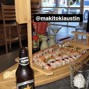 sushi and beer on a table
