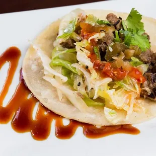 this is a new appetizer that they are promoting. its called kbbq taco. sweet, spicy and yummy. very delic.