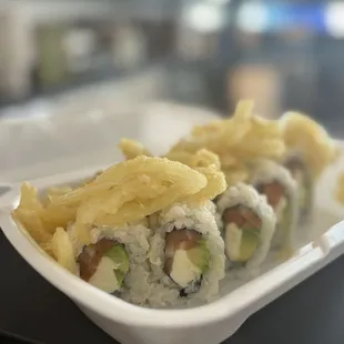 Philadelphia roll with added crispy onions on top