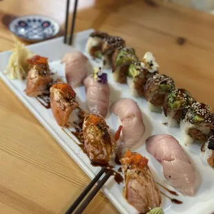 Special custom made roll, seared salmon nigiri (also special order) and  no. 34. Yellowtail Nigiri Sushi.