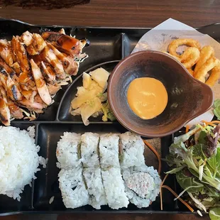 151. Three Choice Bento Dinner with teriyaki chicken, CA rolls, fried calamari