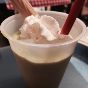 Complimentary green tea ice cream with a choco filled wafer stick