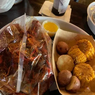 How the spicy Crawfish add fixings come!