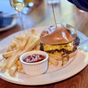 Smash burger with a side of fries.