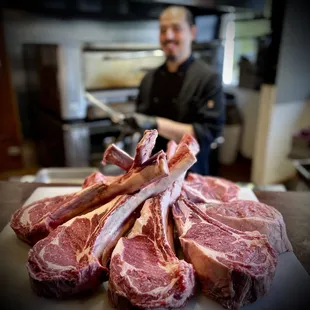 Chef Francisco carving up 42oz tomahawk steaks