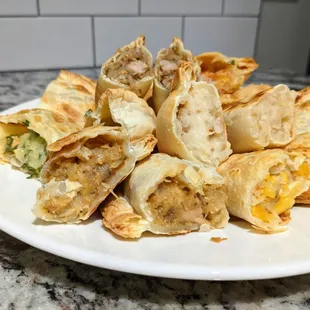 I cut open all 10 different empanadas to take pictures of the insides, individually. Part of the $28.50 Family Meal that includes sides.