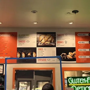 a woman standing in front of a counter