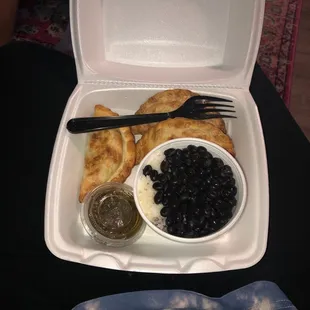 a meal in a styrofoam container