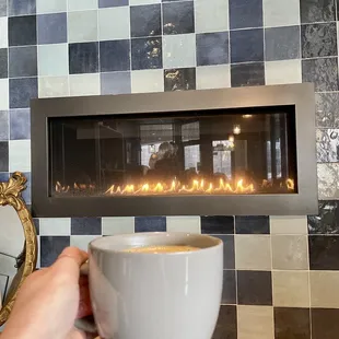 Chai and cozy fireplace