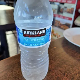 They have bottles of water, not glasses