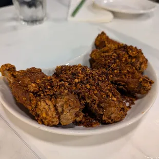 Mala Wings with dry pepper rub, Szechuan peppercorn, drizzle of sweet soy