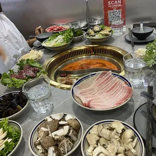Sweet and sour tomato broth and 12-hour simmered chicken broth