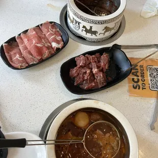 Tomato beef broth, lamb, steak flank