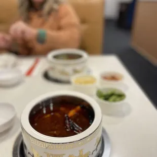 a woman sitting at a table