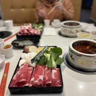 a woman sitting at a table