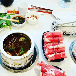 Mala Broth with dried chili peppers and sliced ginger