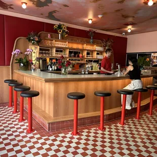 a man sitting at a bar