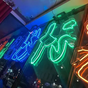 a neon sign in a bar
