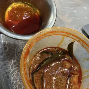 Malabar fish curry drenched in oil.