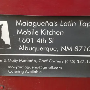 a sign for a mobile kitchen