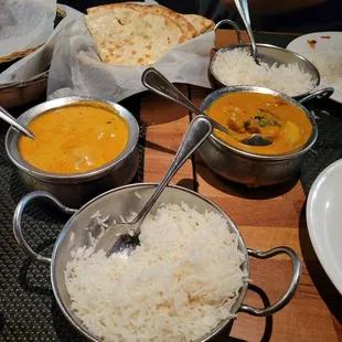 Malai Kofta (left), chicken rizzala (right), paneer cheese naan (top) &amp; rice