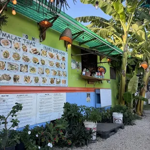 a colorful building with a sign on it