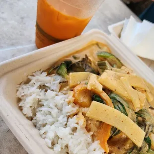 Red curry with chicken and Thai tea.