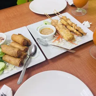 Thai tea, Spring roll and chicken satay.