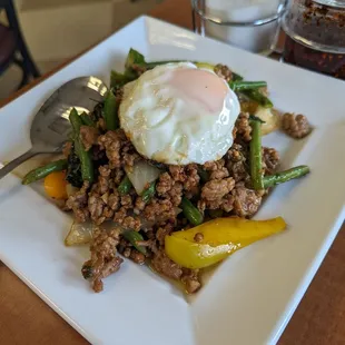 Holy Basil Stir Fried with Ground Pork.  Vegetables are fresh and crunchy, best you choose beef or chicken instead. 3.5.24