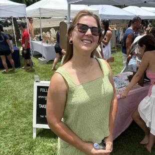 Showing off my permanent jewelry the booth behind me was selling