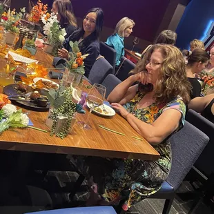 She said she wasn't creative with flowers and we told her she would surprise herself after going through the workshop with our instruction.