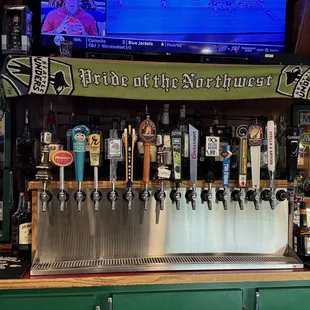 a bar with beer taps