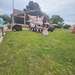Cornhole, big chair for photos, and the important part! Smokers...