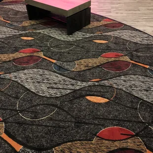 New modern wood seating with new carpet, flooring etc..