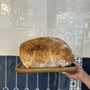 Call ahead and order a loaf of bread to bring home