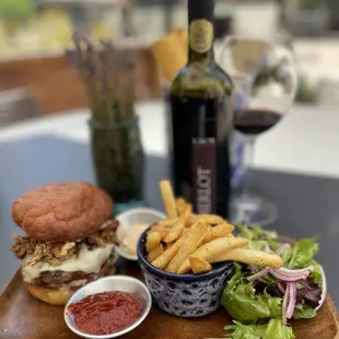 Hamburger special with pulled pork sandwich and a bottle of Merlot