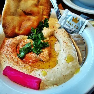 Hummus we filled with Olive Oil Love with HOT Puffy Bread straight outta the oven