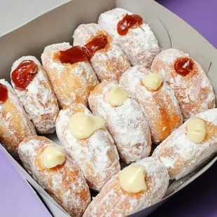 Our famous malasadas are light and fluffy! Plain and our fruit flavors (such as Guava and Mango) are Vegan!