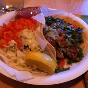 Fish taco (left) &amp; pork adobada taco (right) to go.  Yummm!