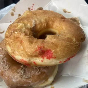 two donuts with red sprinkles