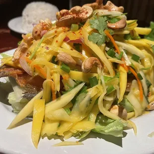 Mango Fish Salad - there is like a whole mango shredded on top of this super crispy and boneless trout