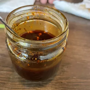 a jar of sauce on a table