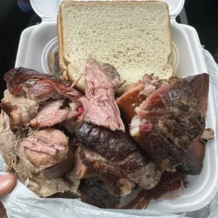 Sampler platter with 3 different kinds of sausage,pulled pork ,ribs(beef and pork), rib tip, bologna