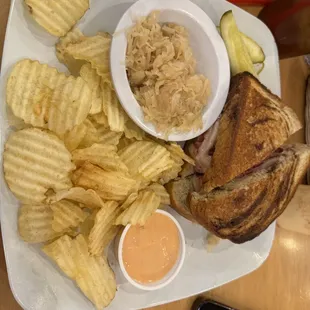 Ruben sandwich with extra kraut on the side