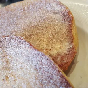 Toasted bagel with cream cheese and cinnamon sugar.