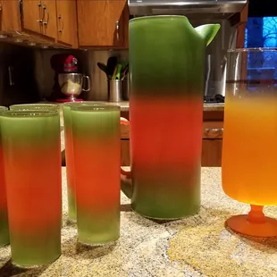 Blendo Hawaiian Pitcher and glasses.  Blendo martini pitcher?